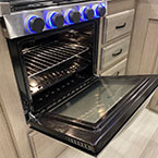 3 burner stainless steel range with oven door shown open May Show Optional Features. Features and Options Subject to Change Without Notice.